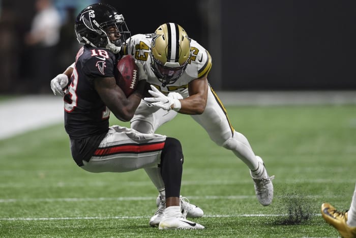 New Orleans safety Marcus Williams (43) tackles Atlanta receiver Calvin Ridley (18). Mandatory Credit: Dale Zanine-USA TODAY Sports